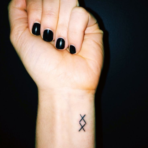 What are some unique and minimalist tattoo designs with deep meaning